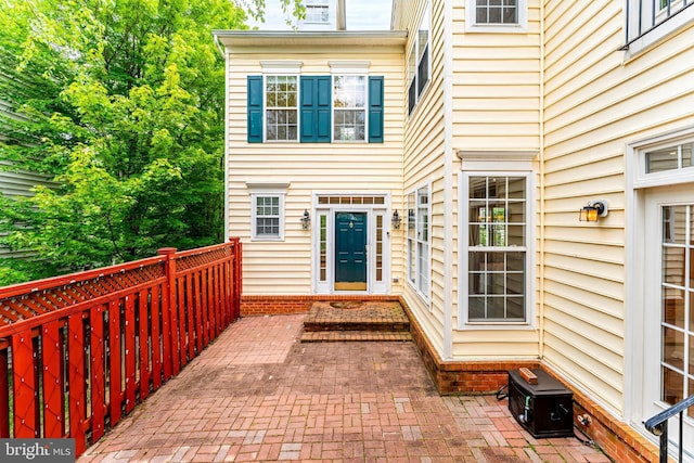 21934 Windover Dr, Broadlands, VA 20148 - view of exterior entry with a patio