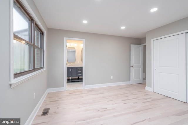 1420 Alexander Way, Bensalem, PA 19020 - unfurnished bedroom with light wood finished floors, baseboards, a closet, connected bathroom, and recessed lighting