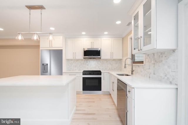 1420 Alexander Way, Bensalem, PA 19020 - kitchen featuring stainless steel appliances, a sink, light wood finished floors, white cabinetry, and recessed lighting