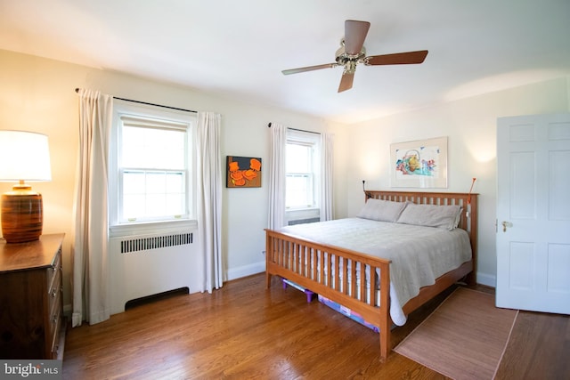 6306 Blackburn Ct, Baltimore, MD 21212 - bedroom with radiator heating unit, wood finished floors, ceiling fan, and baseboards