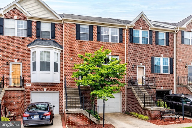 43103 Forest Edge Sq, Broadlands, VA 20148 - view of property with concrete driveway and brick siding