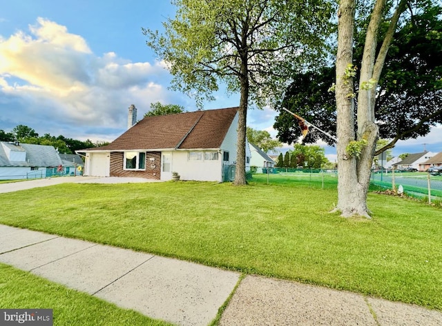 7 Hay Rd, Levittown, PA 19056 - view of front facade with driveway and brick siding