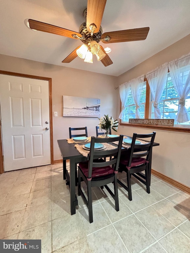 7 Hay Rd, Levittown, PA 19056 - dining space with baseboards, a ceiling fan, and tile patterned floors