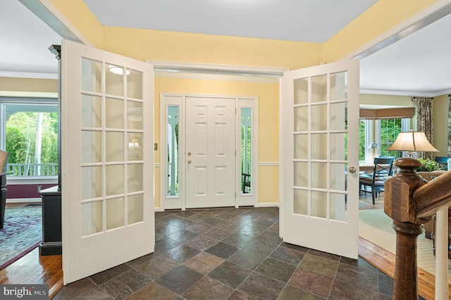 9020 Old Dominion Dr, Mclean, VA 22102 - entryway featuring french doors, stone tile flooring, and crown molding