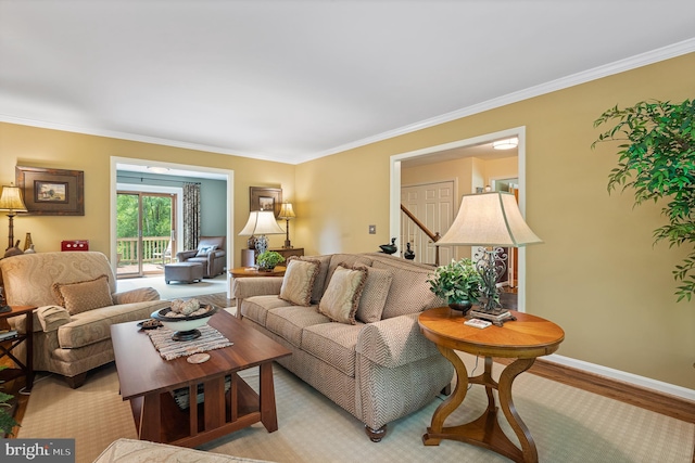 9020 Old Dominion Dr, Mclean, VA 22102 - living room featuring crown molding, light wood-style flooring, baseboards, and stairs