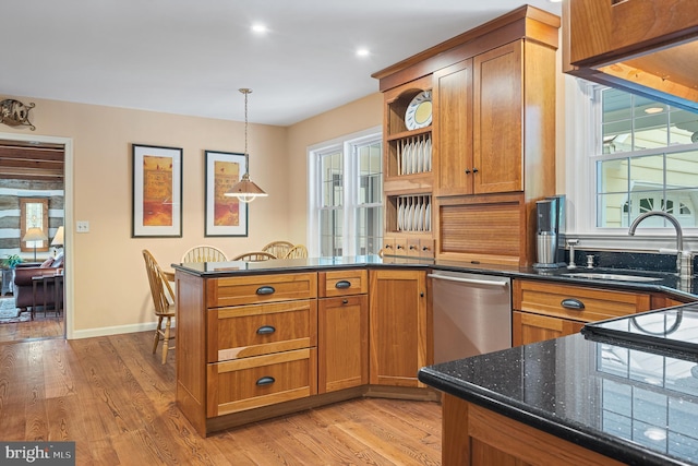 9020 Old Dominion Dr, Mclean, VA 22102 - kitchen with a peninsula, brown cabinetry, stainless steel dishwasher, open shelves, and light wood-style floors