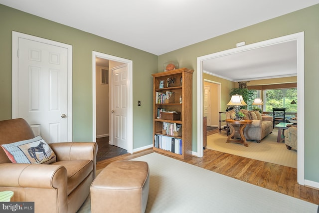 9020 Old Dominion Dr, Mclean, VA 22102 - living area featuring baseboards and wood finished floors