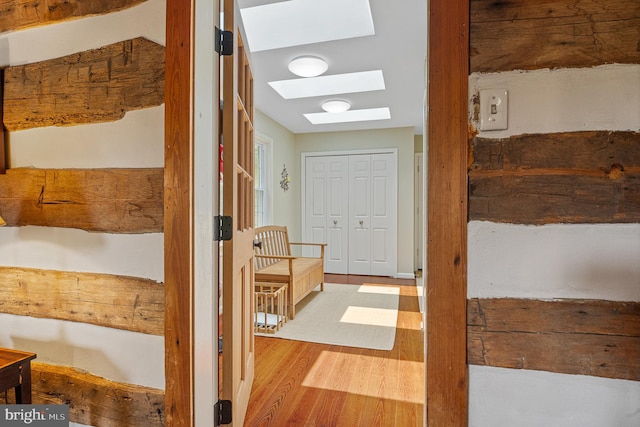 9020 Old Dominion Dr, Mclean, VA 22102 - bathroom featuring a skylight and wood finished floors