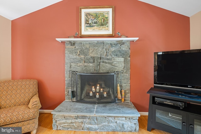 9020 Old Dominion Dr, Mclean, VA 22102 - living area featuring vaulted ceiling, wood finished floors, baseboards, and a fireplace