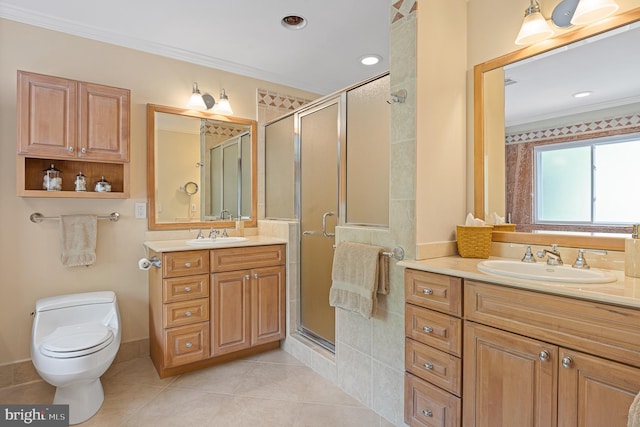 9020 Old Dominion Dr, Mclean, VA 22102 - bathroom with ornamental molding, two vanities, a shower stall, toilet, and tile patterned floors