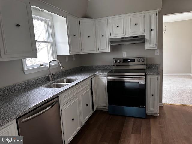 70 Victoria Ln, Frostburg, MD 21532 - kitchen featuring under cabinet range hood, stainless steel electric stove, dishwashing machine, a sink, and healthy amount of natural light