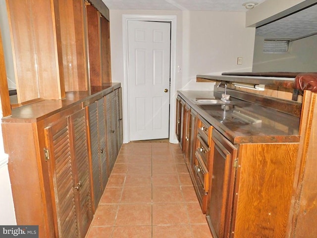 70 Victoria Ln, Frostburg, MD 21532 - bar area featuring a sink and light tile patterned flooring