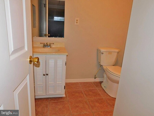 70 Victoria Ln, Frostburg, MD 21532 - bathroom with tile patterned floors, vanity, toilet, and baseboards