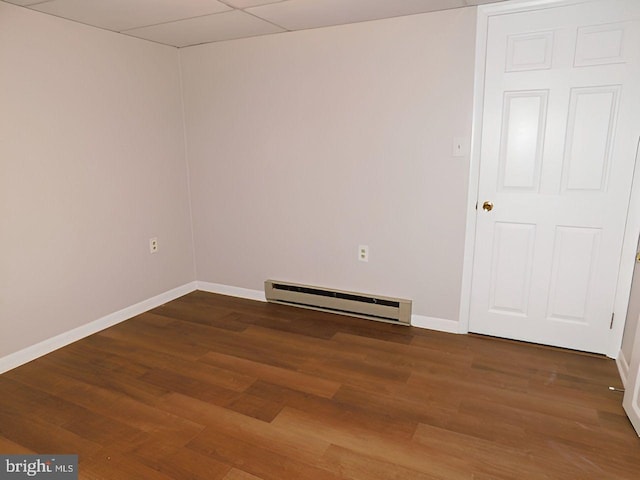 70 Victoria Ln, Frostburg, MD 21532 - spare room featuring a baseboard radiator, wood finished floors, and baseboards