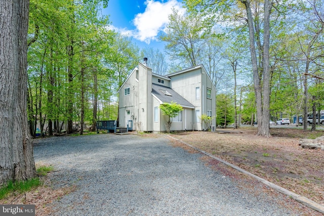 7572 Eagle Rock Dr, Tobyhanna, PA 18466 - view of side of home featuring driveway and a shingled roof