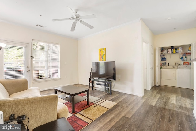 5170 William Colin Ct, Centreville, VA 20120 - living area featuring washing machine and dryer, wood finished floors, ceiling fan, baseboards, and ornamental molding