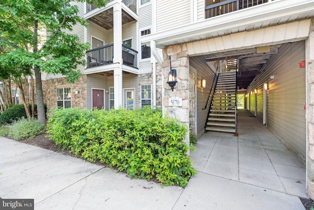 5170 William Colin Ct, Centreville, VA 20120 - entrance to property with stone siding and a balcony