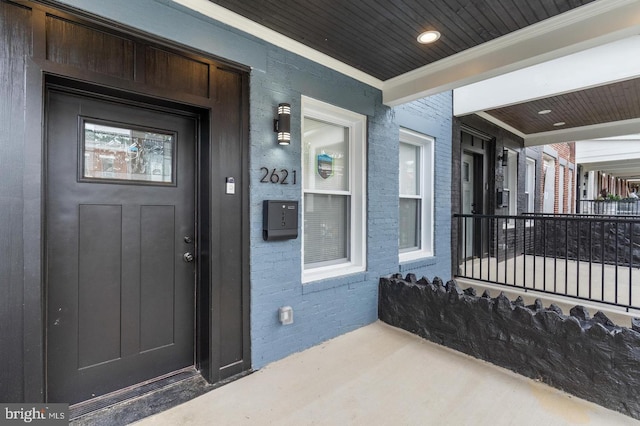 2132 E Federal St, Baltimore, MD 21213 - view of exterior entry with brick siding and a porch