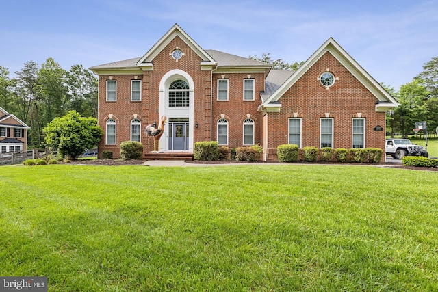 13128 Kahns Rd, Manassas, VA 20112 - colonial house with brick siding and a front lawn