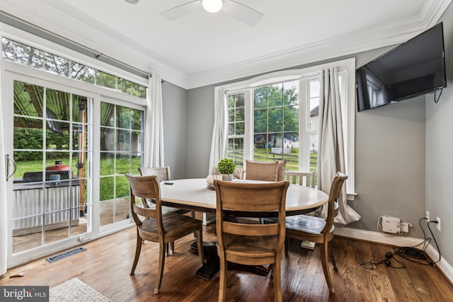 13128 Kahns Rd, Manassas, VA 20112 - dining space with crown molding, a ceiling fan, light wood-type flooring, and baseboards