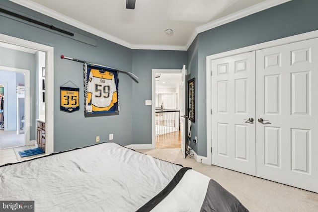 13128 Kahns Rd, Manassas, VA 20112 - bedroom featuring a closet, crown molding, carpet floors, baseboards, and ceiling fan