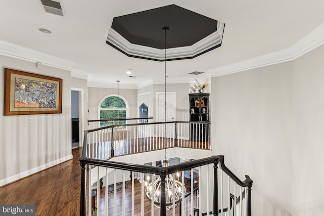13128 Kahns Rd, Manassas, VA 20112 - corridor with a raised ceiling, crown molding, wood finished floors, an upstairs landing, and baseboards