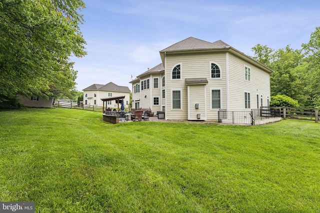 13128 Kahns Rd, Manassas, VA 20112 - rear view of house featuring a patio area