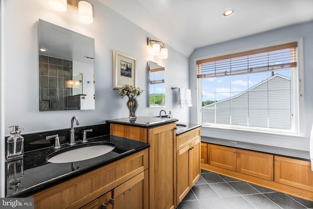 6249 Auburn Leaf Ln, Alexandria, VA 22312 - full bath with healthy amount of natural light, vanity, tile patterned floors, recessed lighting, and a tile shower