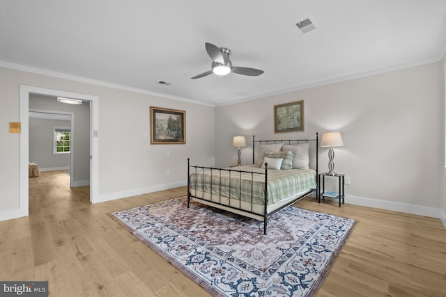 6358 Brampton Ct, Alexandria, VA 22304 - bedroom featuring ornamental molding, light wood finished floors, baseboards, and ceiling fan