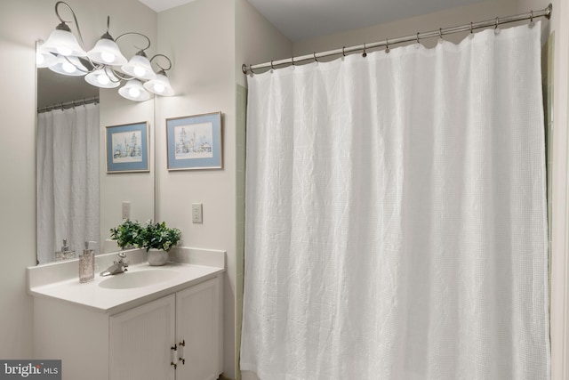 6358 Brampton Ct, Alexandria, VA 22304 - full bath with vanity and a chandelier