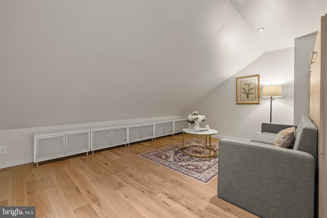 6358 Brampton Ct, Alexandria, VA 22304 - living room featuring vaulted ceiling, wood finished floors, and baseboards