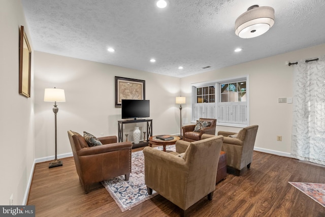 6358 Brampton Ct, Alexandria, VA 22304 - living area featuring wood finished floors, a textured ceiling, baseboards, and recessed lighting