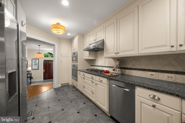 6358 Brampton Ct, Alexandria, VA 22304 - kitchen with appliances with stainless steel finishes, under cabinet range hood, recessed lighting, backsplash, and cream cabinets