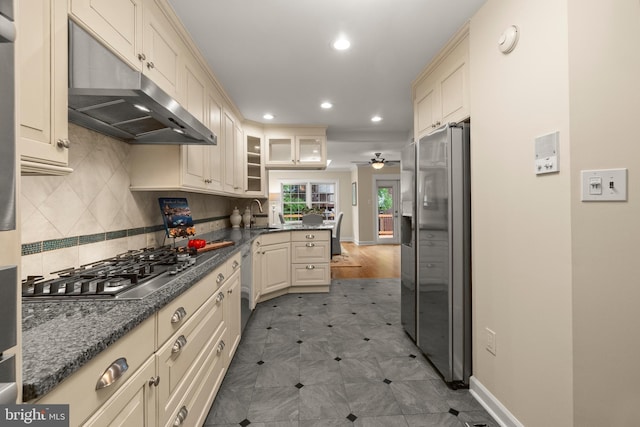 6358 Brampton Ct, Alexandria, VA 22304 - kitchen featuring under cabinet range hood, appliances with stainless steel finishes, cream cabinets, recessed lighting, and a peninsula