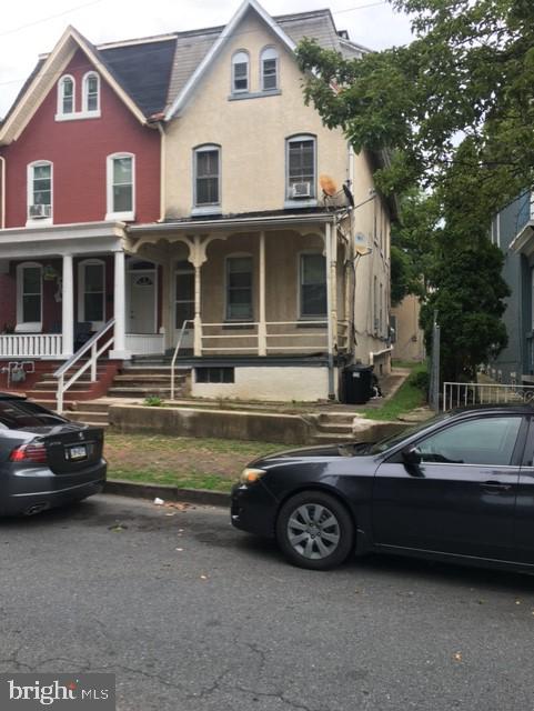 725 N 2nd St, Reading, PA 19601 - view of front of home featuring covered porch