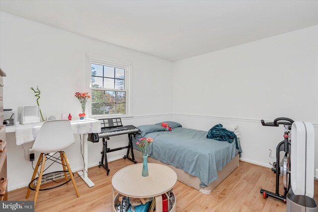 6009 Shady Spring Ave, Rosedale, MD 21237 - bedroom featuring wood finished floors and baseboards