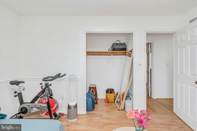 6009 Shady Spring Ave, Rosedale, MD 21237 - workout area with wood finished floors and baseboards