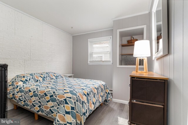 125 S Main St, Mahanoy City, PA 17948 - bedroom with wood finished floors and ornamental molding