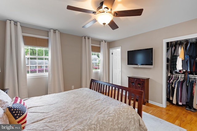 207 Wilshire Ln, Newark, DE 19711 - bedroom with wood finished floors, a closet, baseboards, and a ceiling fan