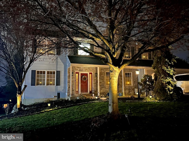 29 Colorado, Sinking Spring, PA 19608 - view of front of home with stone siding and a front yard