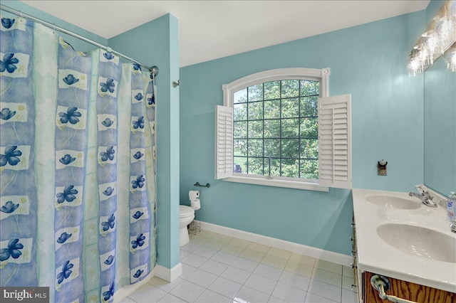 29 Colorado Ave, Sinking Spring, PA 19608 - full bathroom with toilet, tile patterned flooring, baseboards, and double vanity