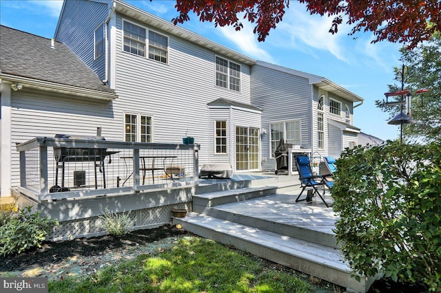 29 Colorado Ave, Sinking Spring, PA 19608 - rear view of property with roof with shingles and a wooden deck