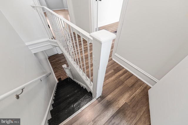 2204 Yelland St, Philadelphia, PA 19140 - stairs featuring wood finished floors