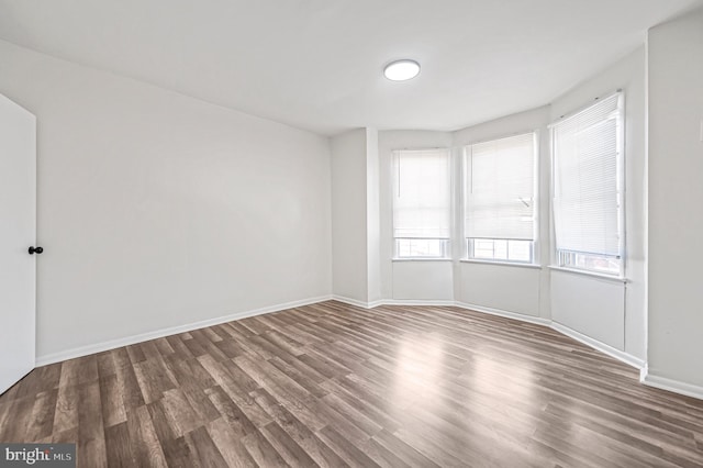 2204 Yelland St, Philadelphia, PA 19140 - spare room with wood finished floors and baseboards