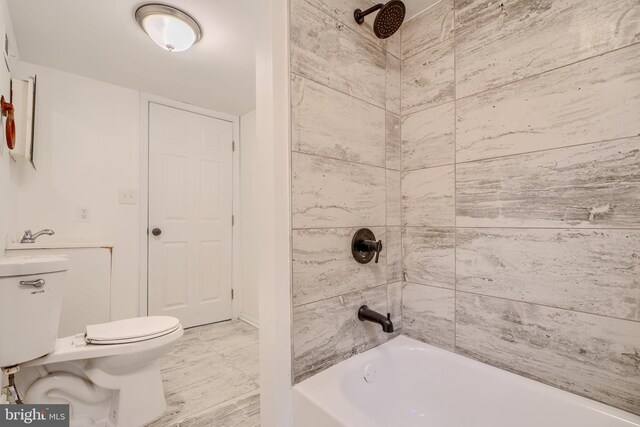227 Elizabeth Ave, Baltimore, MD 21225 - full bathroom with toilet and washtub / shower combination