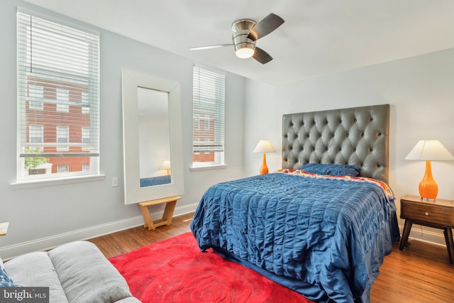 202 E Lafayette Ave, Baltimore, MD 21202 - bedroom featuring wood finished floors, baseboards, and ceiling fan