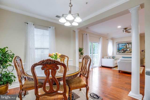 9722 Holmes Pl Unit 307, Manassas Park, VA 20111 - dining area with decorative columns, wood finished floors, ornamental molding, a chandelier, and a ceiling fan