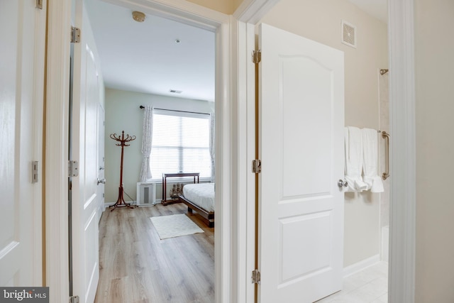 9722 Holmes Pl Unit 307, Manassas Park, VA 20111 - bathroom with wood finished floors and a shower