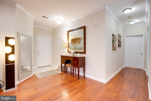 9722 Holmes Pl Unit 307, Manassas Park, VA 20111 - entrance foyer with light wood-style floors, baseboards, and ornamental molding