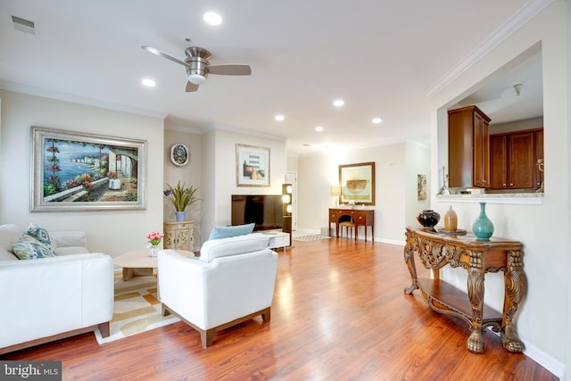 9722 Holmes Pl Unit 307, Manassas Park, VA 20111 - living room featuring a ceiling fan, crown molding, wood finished floors, recessed lighting, and baseboards